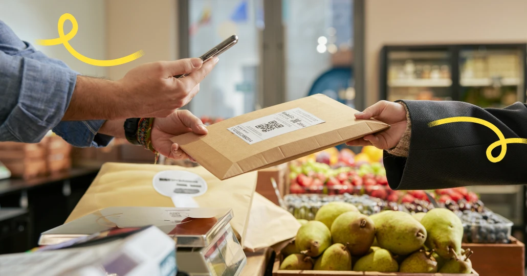 An image of two hands holding a parcel